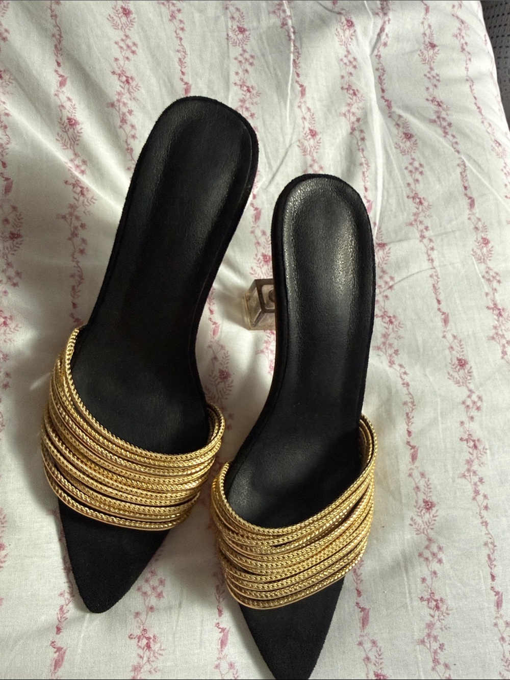 Black and gold heels